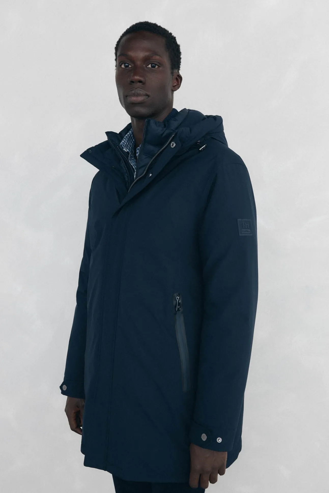 Parka corta capucha