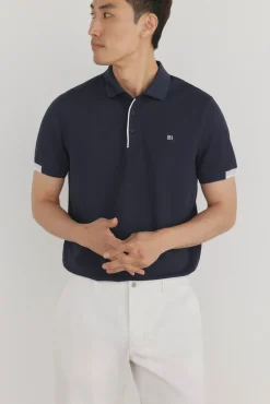 Polo puños contraste