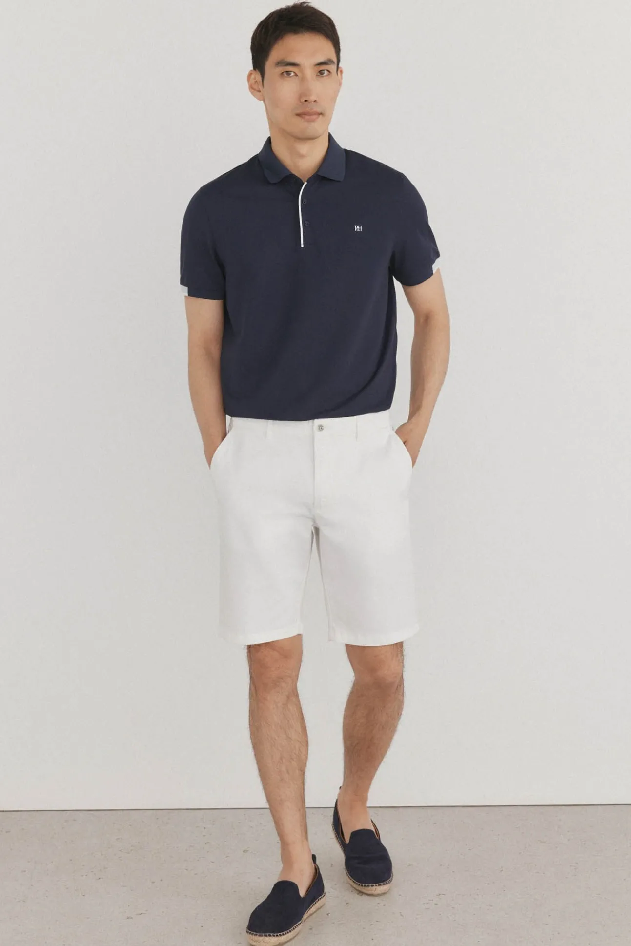 Polo puños contraste