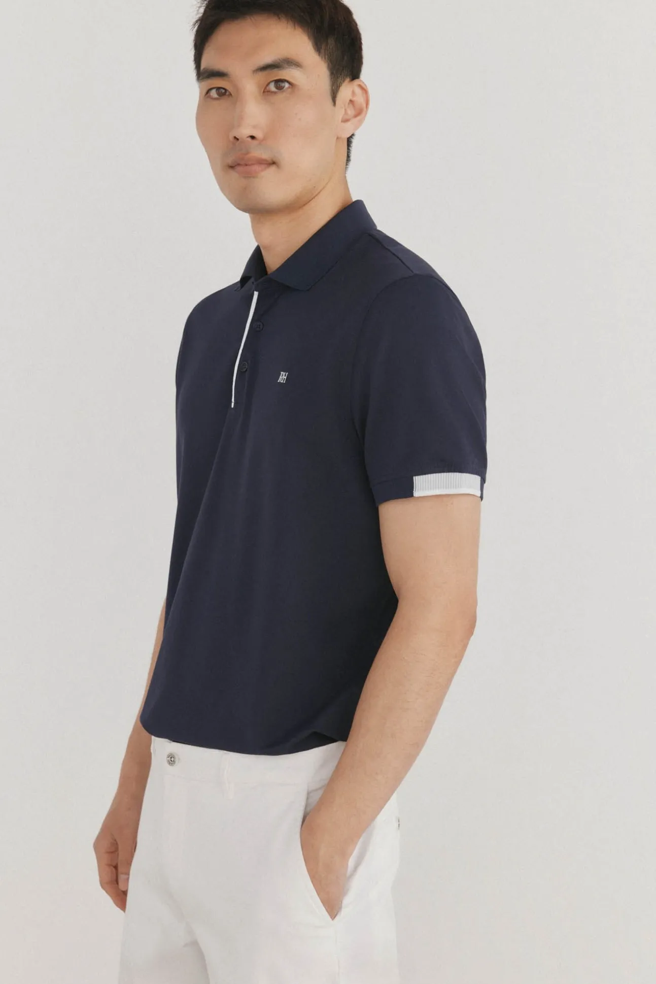 Polo puños contraste
