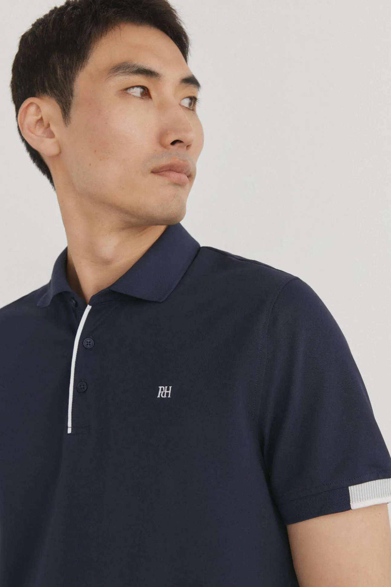 Polo puños contraste