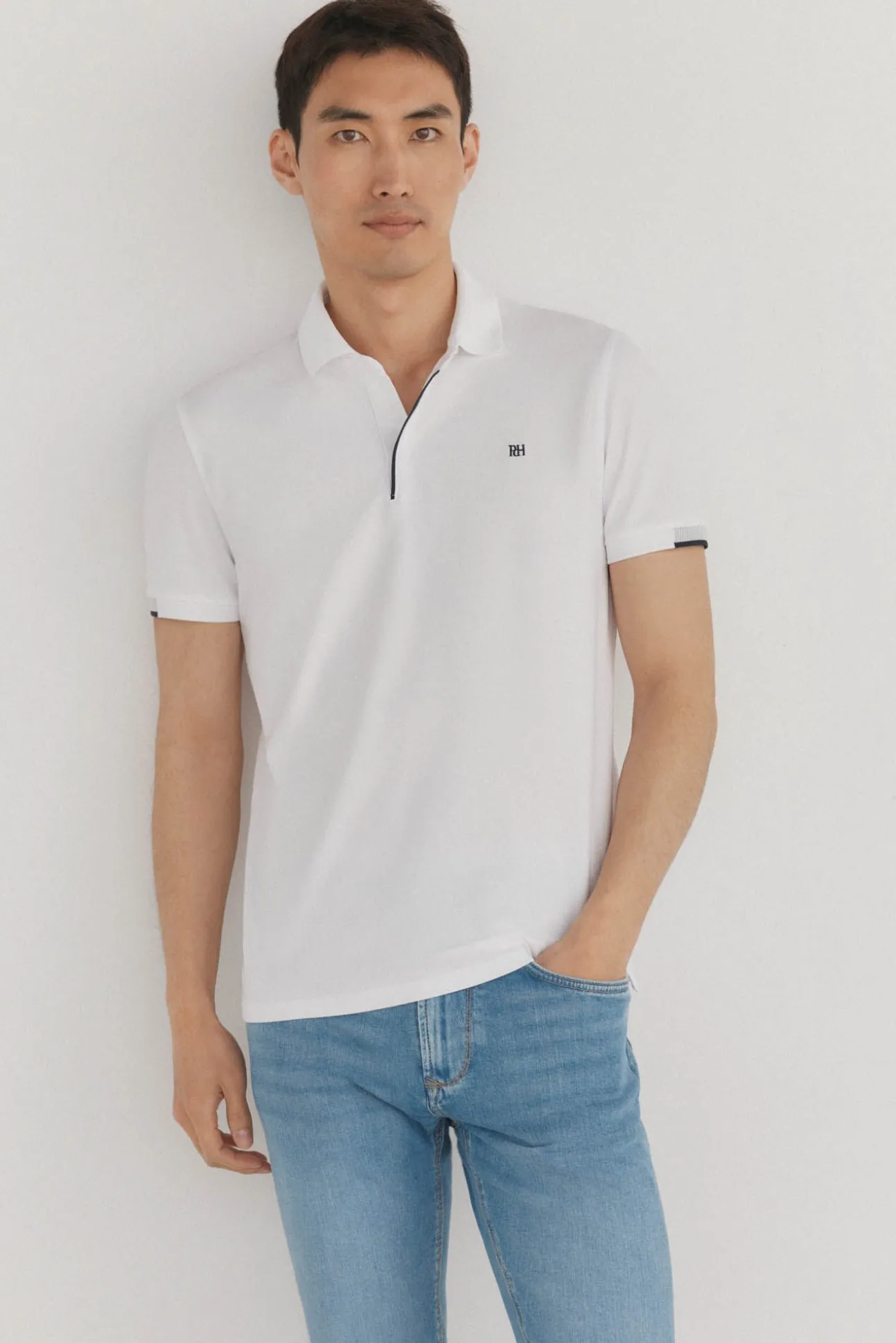 Polo puños contraste