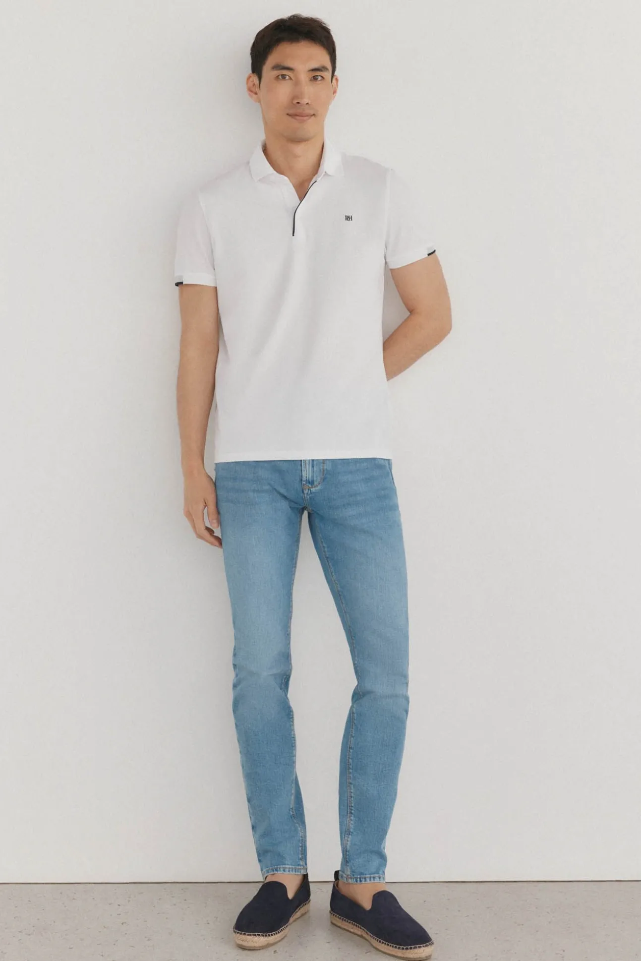 Polo puños contraste