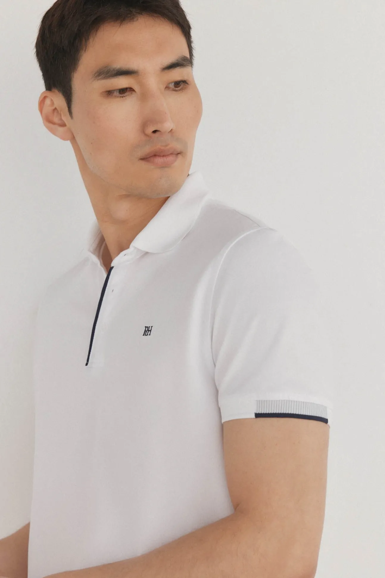 Polo puños contraste