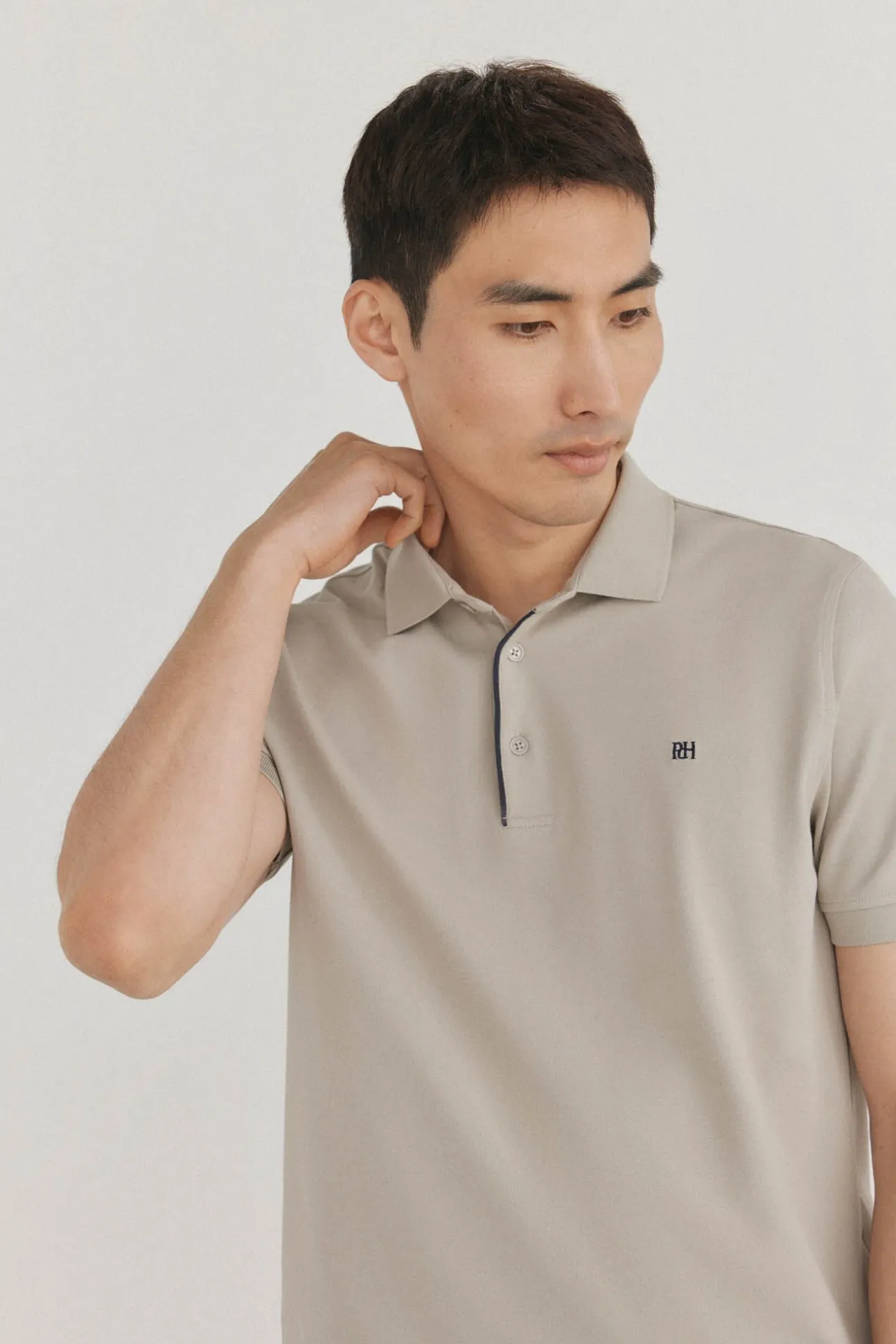Polo puños contraste