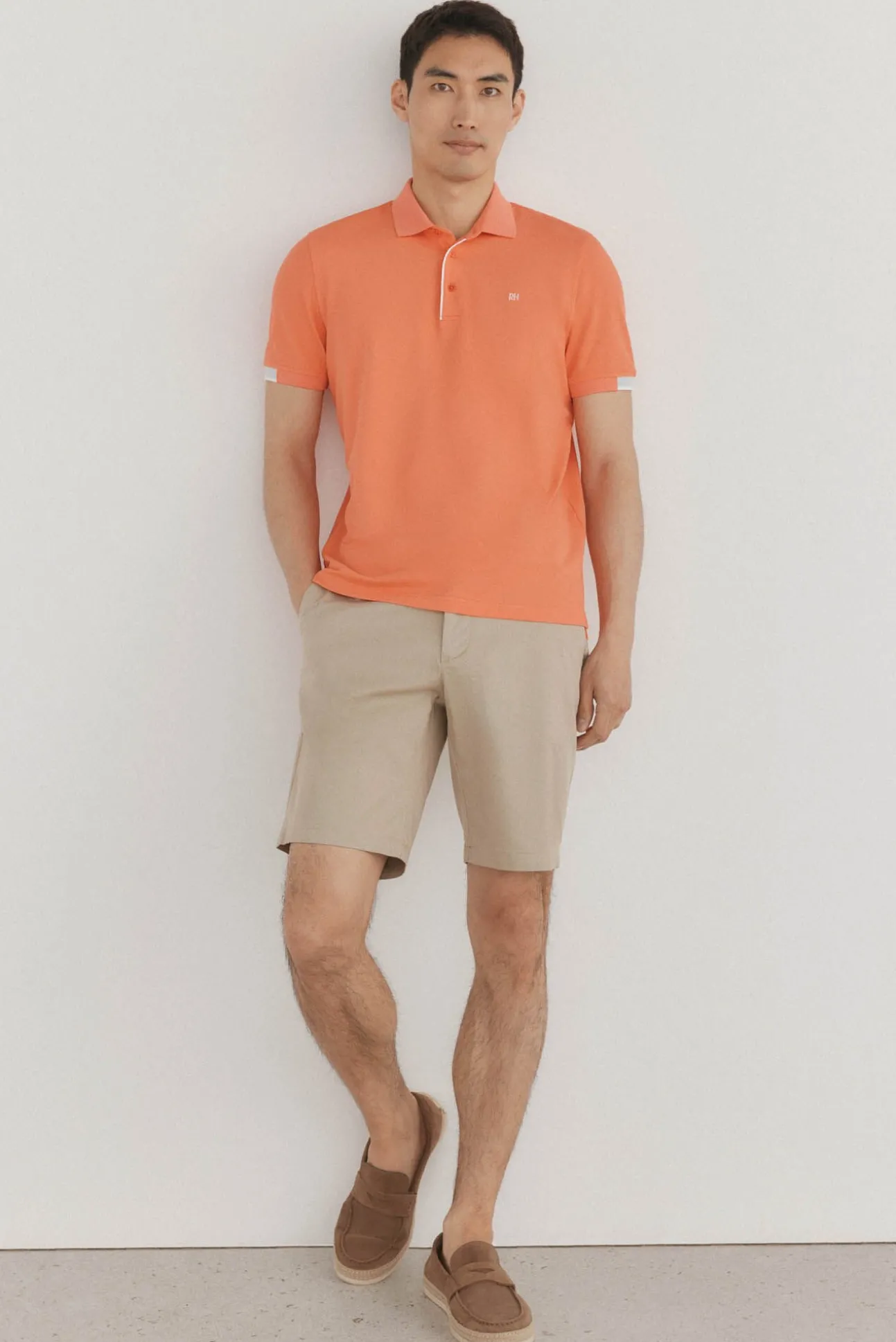 Polo puños contraste