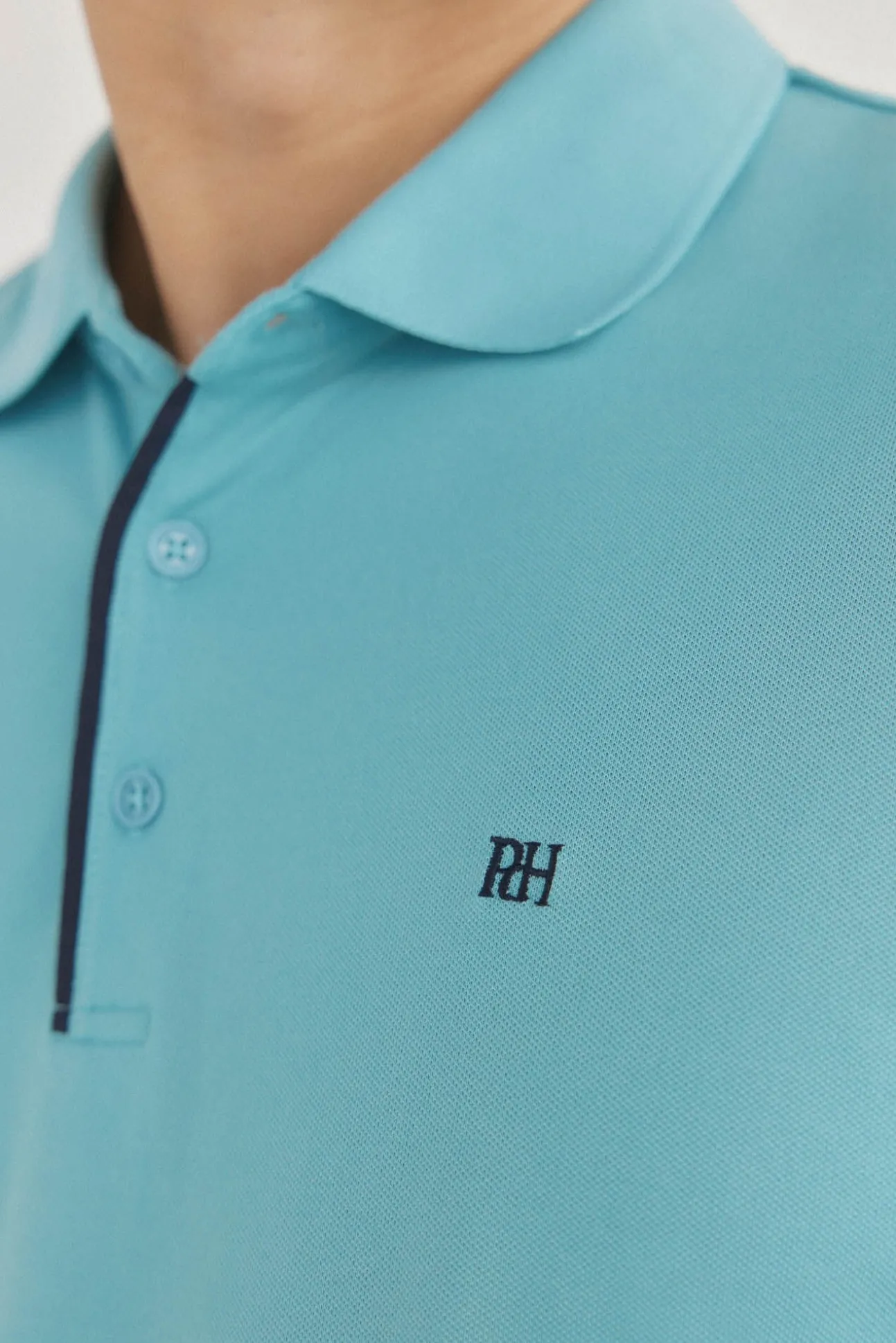 Polo puños contraste