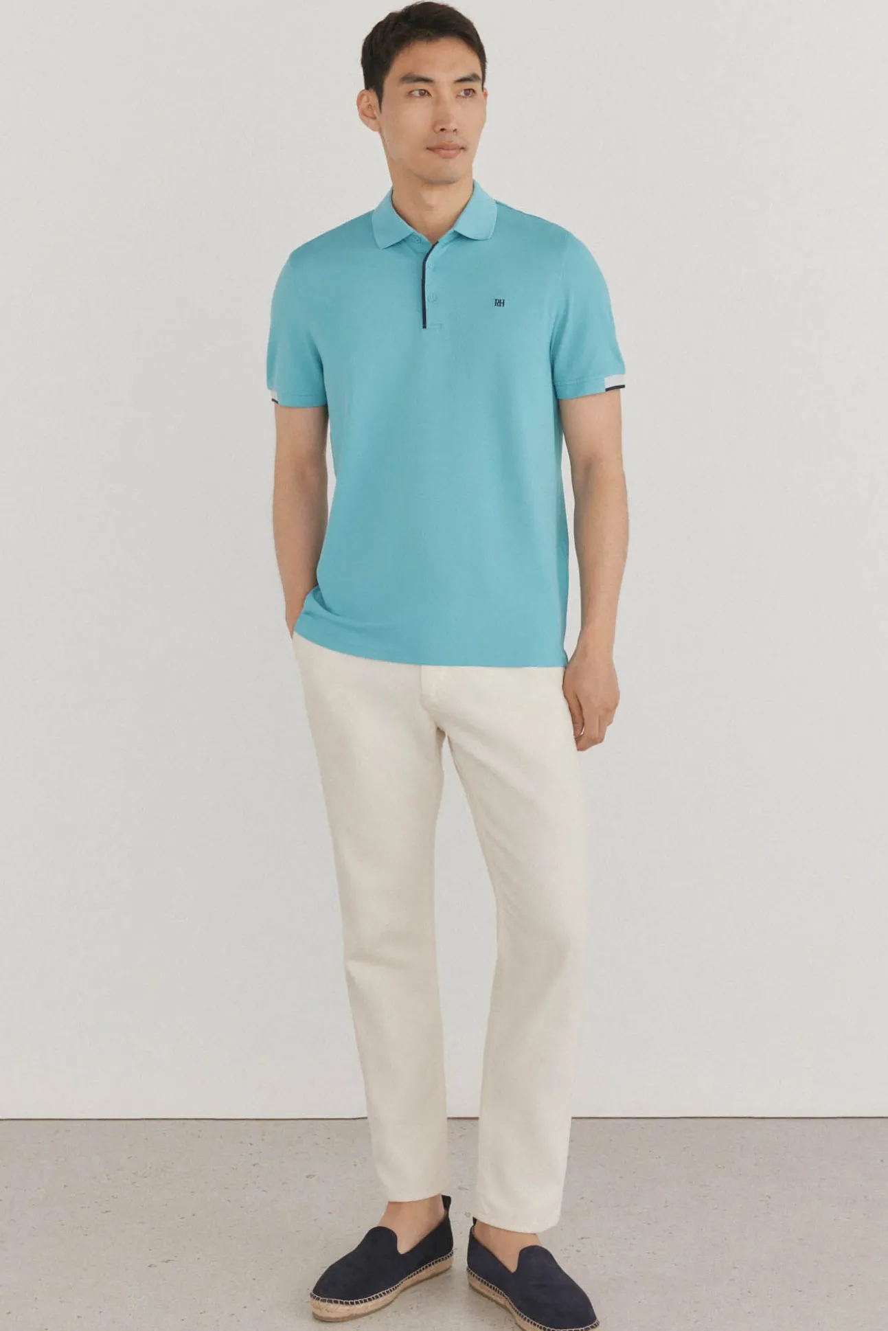 Polo puños contraste