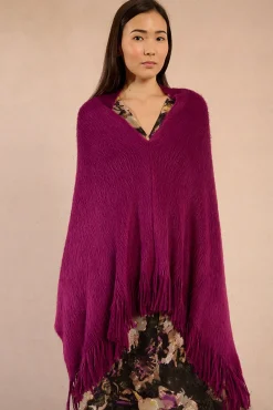 Poncho asimétrico con flecos