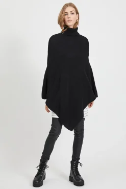 Poncho de punto con cuello vuelto