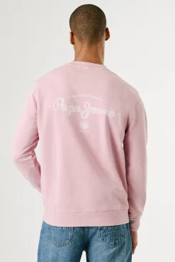 Sudadera lavada con logo pequeño frontal y logo grande en la espalda.