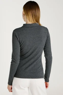 Top de manga larga con cuello polo