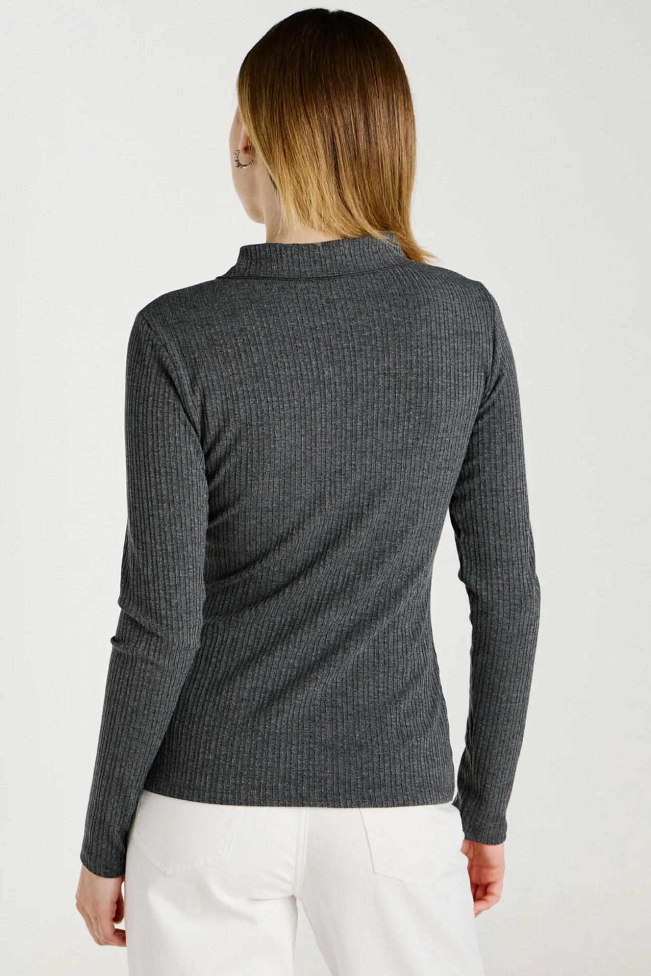 Top de manga larga con cuello polo
