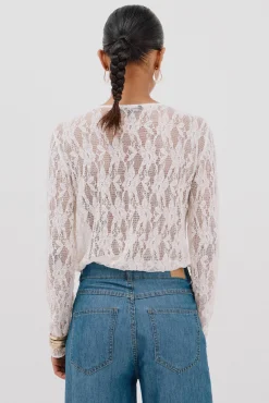 Top encaje volante