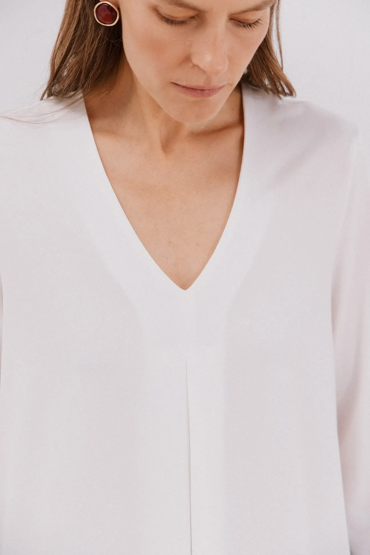 Top fluido pliegue
