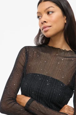 Top transparente con purpurina